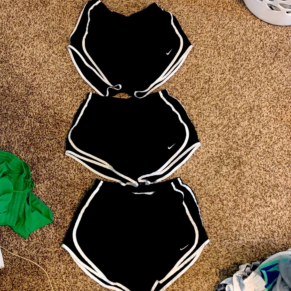 3 pairs of Nike running shorts